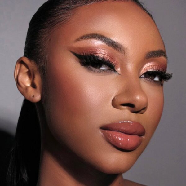 Model is wearing PAT McGRATH LABS Luminous Legends Eye Shadow Duo: Petallic Passion blingingbeauty.com gift guide 2024