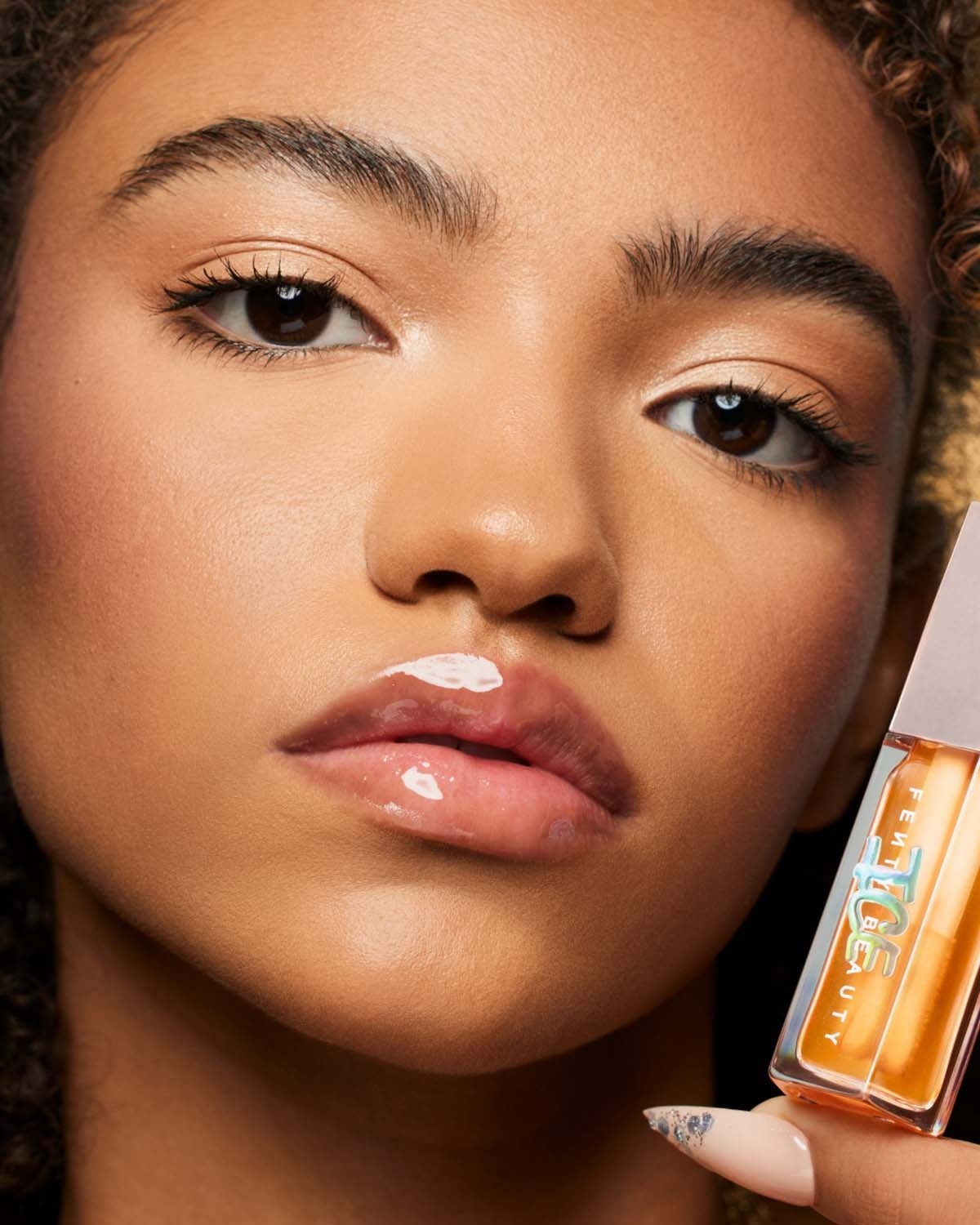 Gloss Bomb Ice Cooling Lip Luminizer in Melon Chillz MODEL