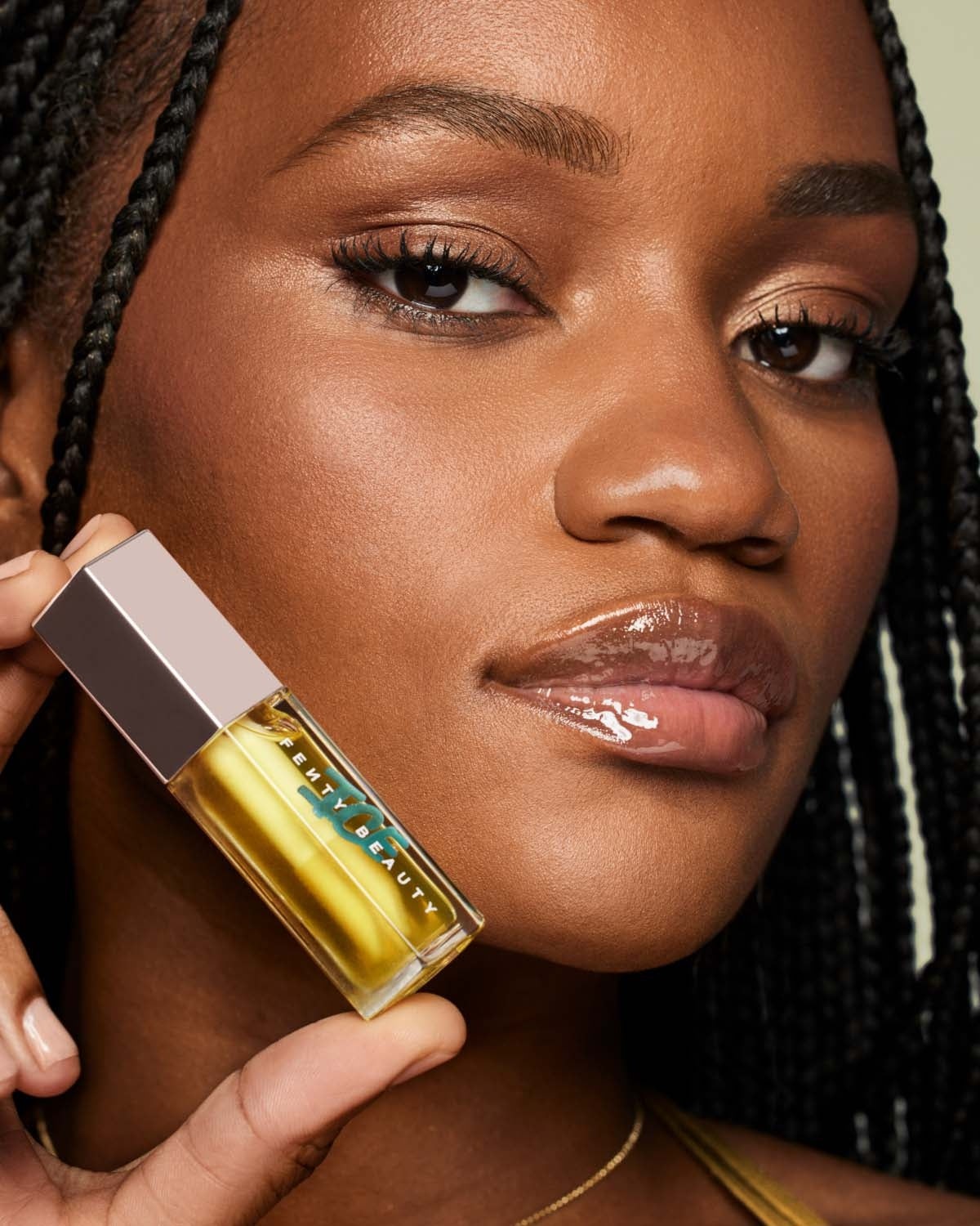 FENTY BEAUTY Gloss Bomb Ice Cooling Lip Luminizer in Pineapple Ice'd model