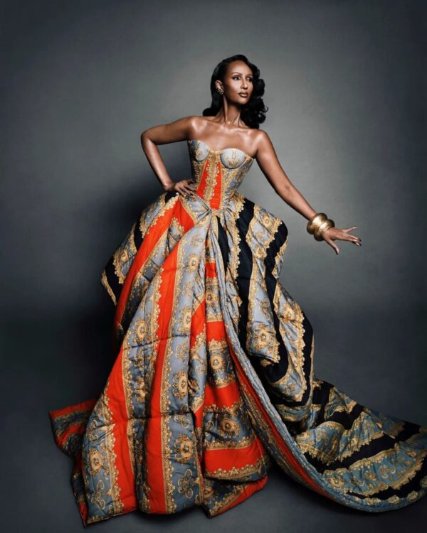 IMAN ELLE SPAIN NOVEMBER 2025 Wearing a Versace Fall/Winter 2025 Gown
